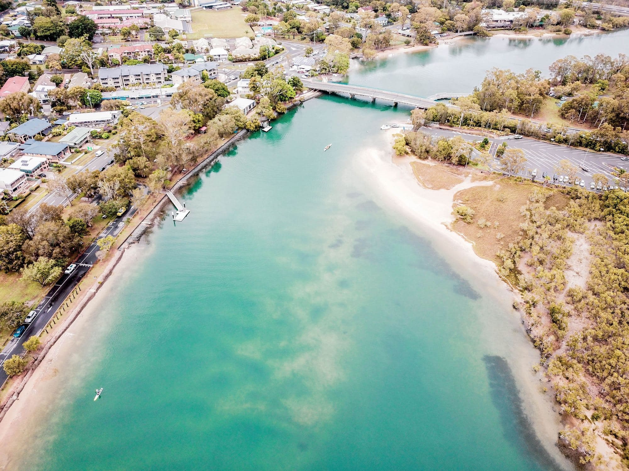 Aerial view of an Australian coastal residential market and its infrastructure