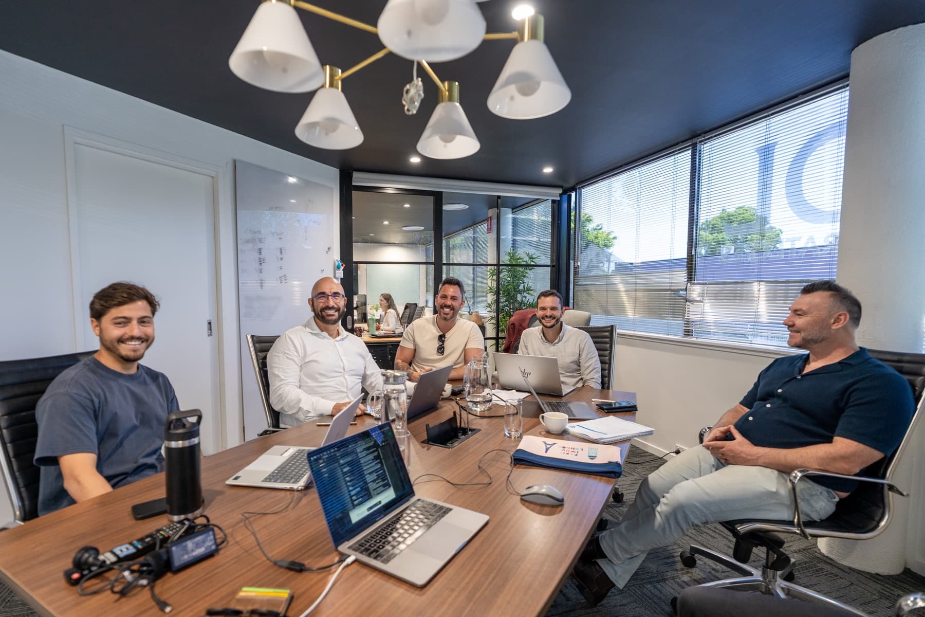 JDL Strategies team discussing long-term portfolio planning